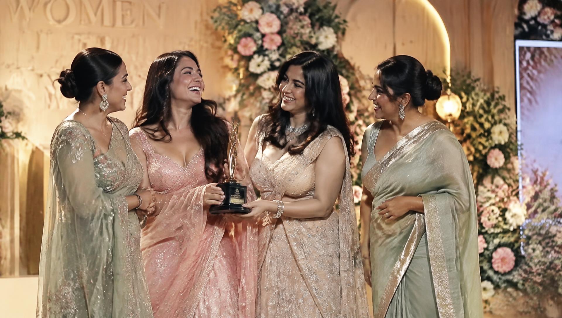 Women of Magical Moms of India celebrating together on stage